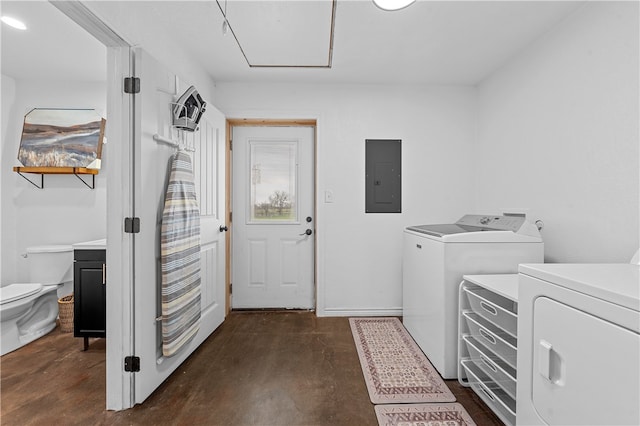 laundry area featuring electric panel and washer and dryer