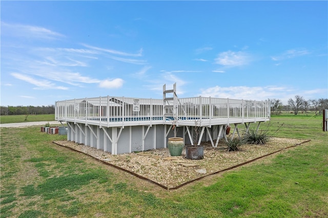 view of pool featuring a yard and a rural view