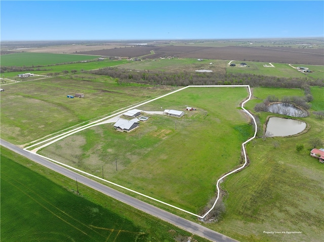 bird's eye view with a rural view and a water view