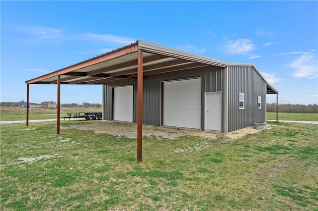 garage with a yard