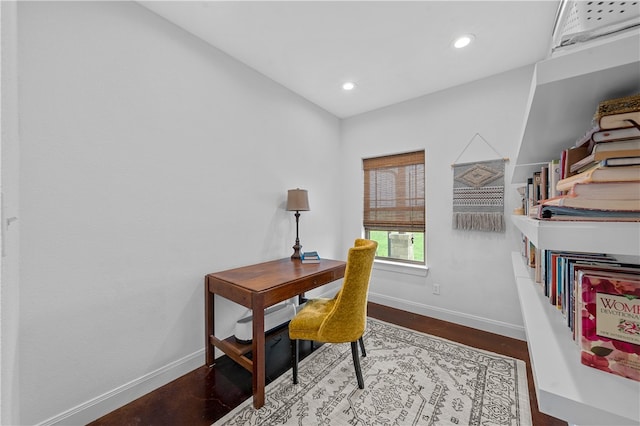 home office with hardwood / wood-style floors