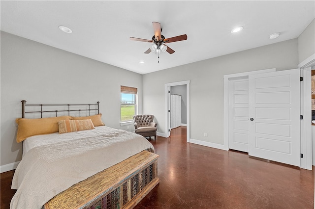 bedroom with ceiling fan and a closet