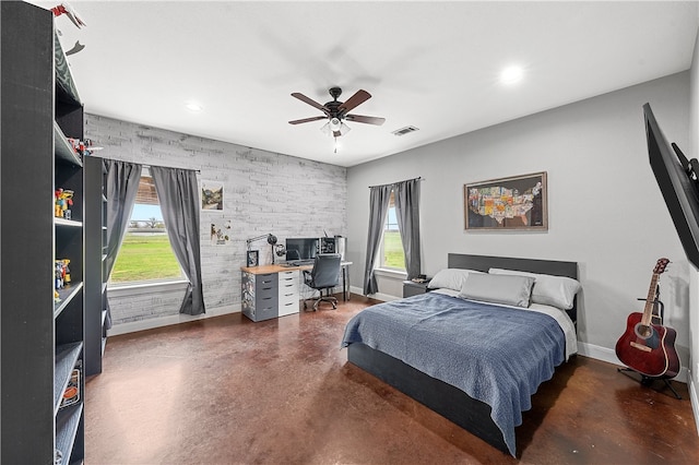 bedroom featuring multiple windows and ceiling fan