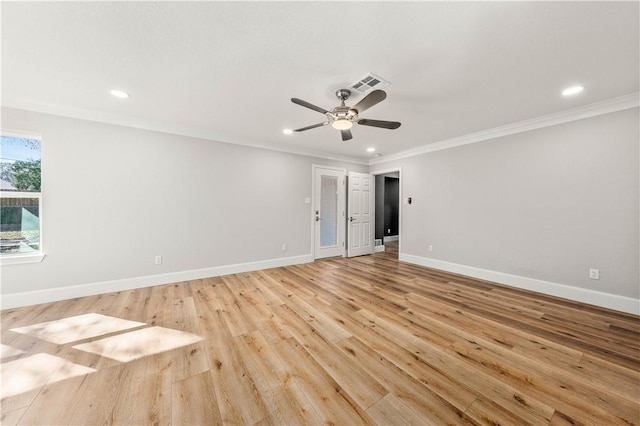 unfurnished room with crown molding, ceiling fan, and light hardwood / wood-style floors