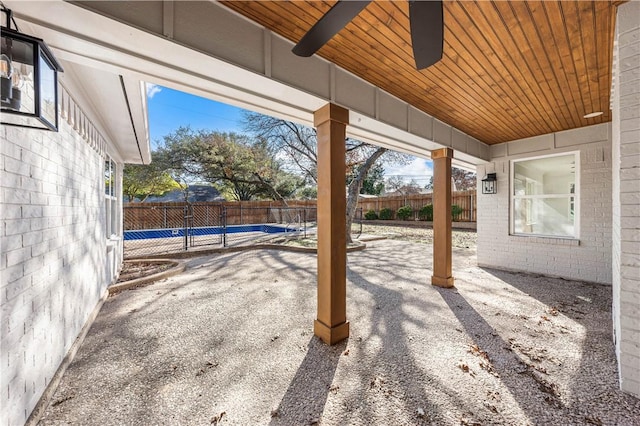 view of patio featuring an empty pool