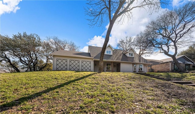 view of front of home with a front lawn