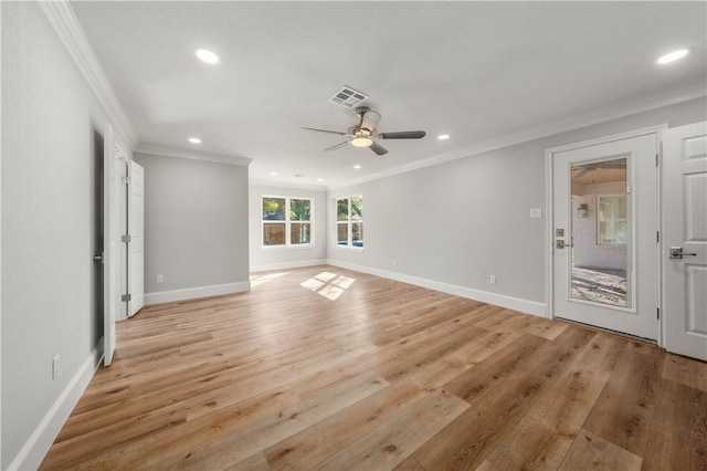 unfurnished living room with crown molding, ceiling fan, and light hardwood / wood-style floors