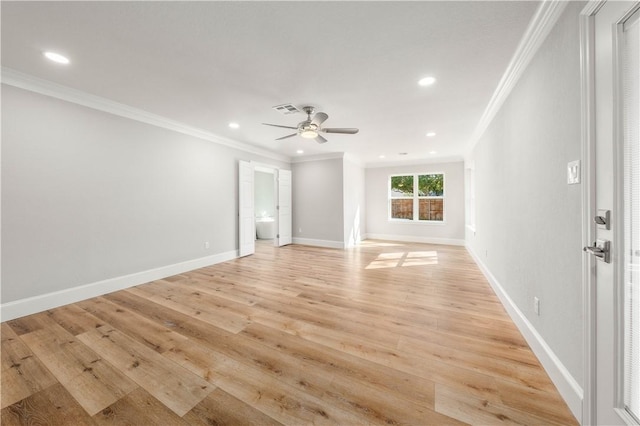 unfurnished living room with crown molding, light hardwood / wood-style flooring, and ceiling fan