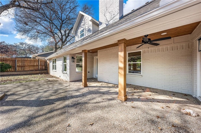 view of patio featuring ceiling fan