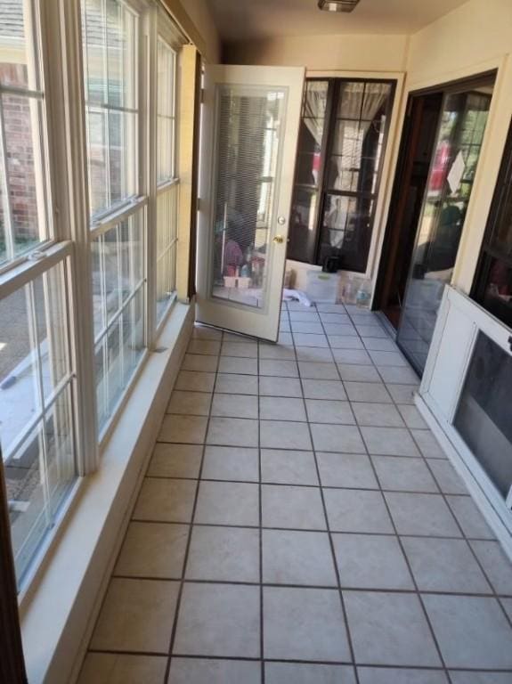 view of unfurnished sunroom