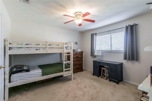 bedroom featuring carpet, visible vents, ceiling fan, and baseboards