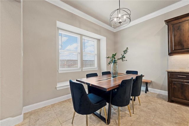 dining room featuring crown molding, a chandelier, and light tile patterned floors