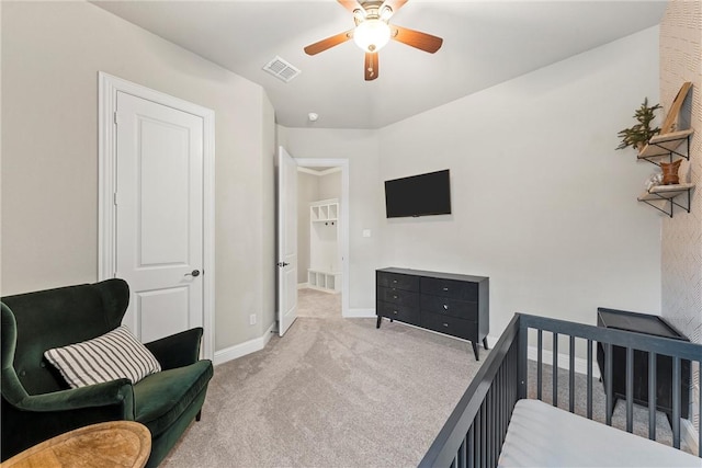 carpeted bedroom featuring ceiling fan