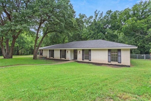 ranch-style house with a front yard