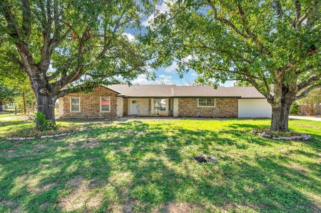 ranch-style home with a front lawn