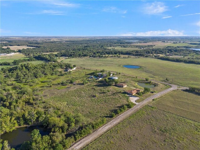 bird's eye view featuring a water view and a rural view