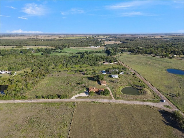 birds eye view of property featuring a rural view