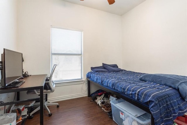 bedroom featuring dark hardwood / wood-style floors and ceiling fan