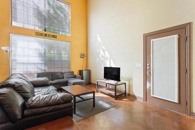 living room with concrete flooring