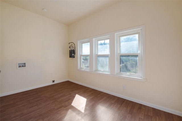 unfurnished room featuring dark hardwood / wood-style flooring