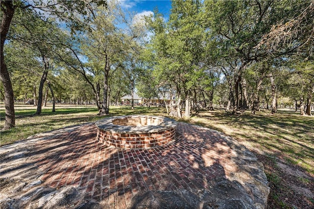 surrounding community featuring a patio