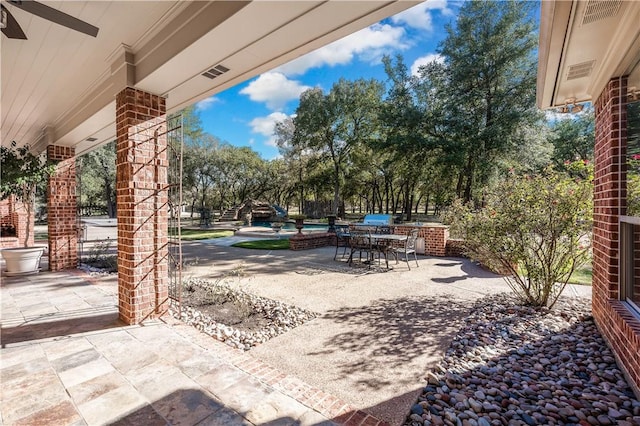 view of patio / terrace with ceiling fan