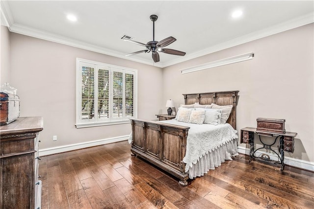 bedroom with ceiling fan, dark hardwood / wood-style flooring, and crown molding