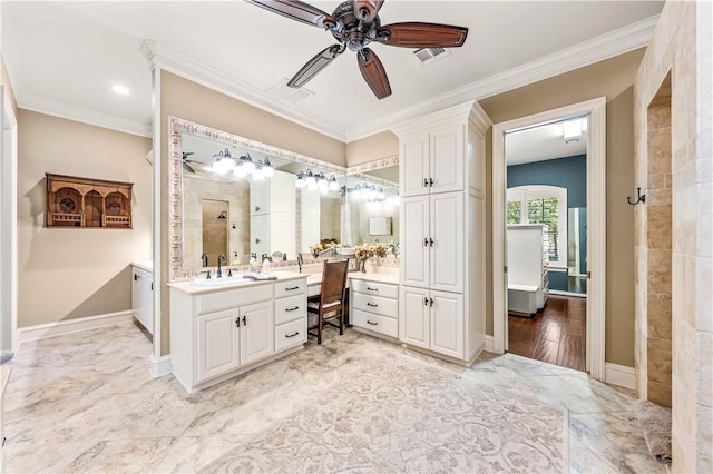 bathroom with walk in shower, ceiling fan, vanity, and ornamental molding