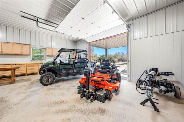 garage with wood walls