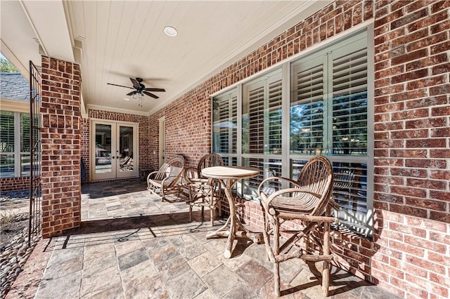 view of patio / terrace with french doors and ceiling fan