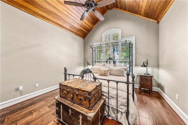 bedroom with ceiling fan, wood-type flooring, wood ceiling, and high vaulted ceiling