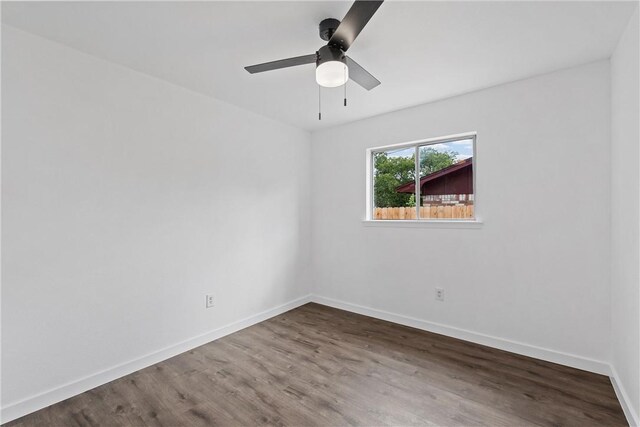 unfurnished room with hardwood / wood-style flooring and ceiling fan