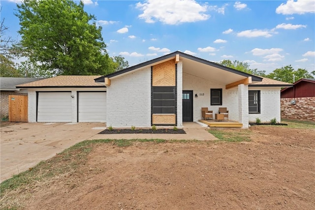 ranch-style home with a garage