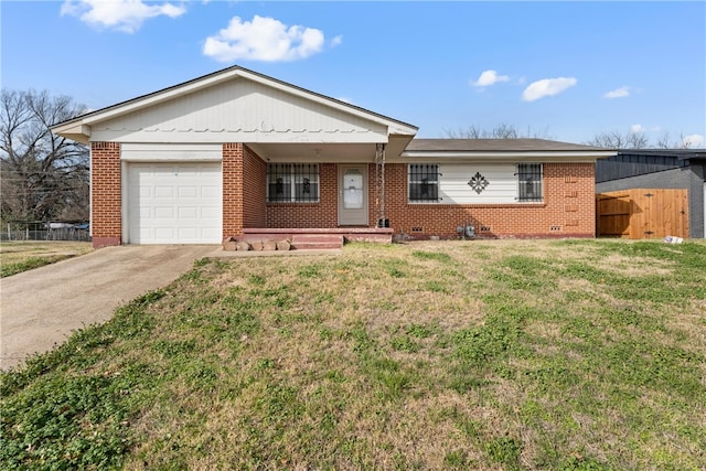 ranch-style house with a front lawn and a garage