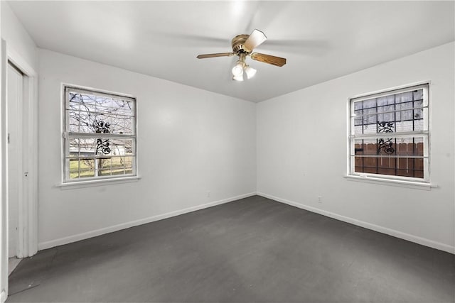 empty room featuring ceiling fan