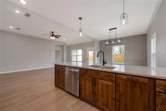 kitchen with ceiling fan, crown molding, sink, pendant lighting, and dishwasher