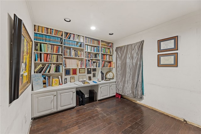 interior space with dark hardwood / wood-style flooring and crown molding