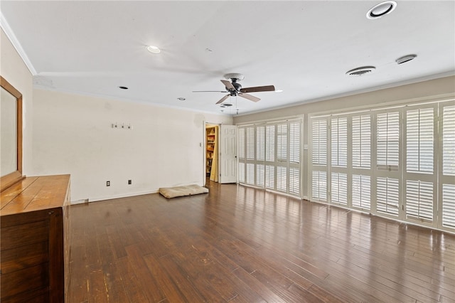 unfurnished living room featuring hardwood / wood-style flooring, ceiling fan, and ornamental molding