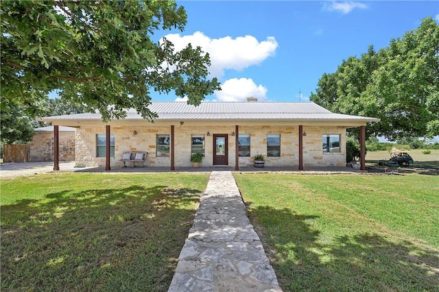 view of front of house with a front lawn