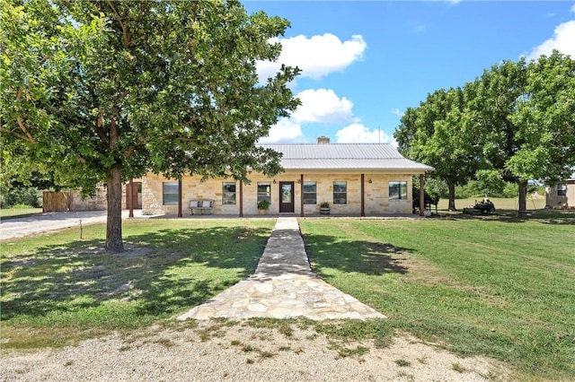 view of front of property with a front lawn