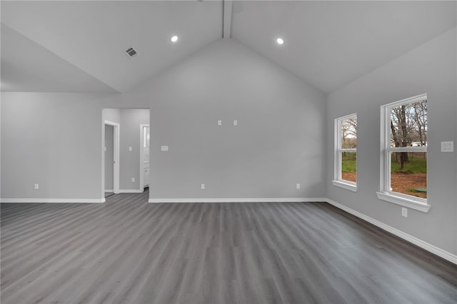 unfurnished living room featuring beam ceiling, high vaulted ceiling, and hardwood / wood-style flooring