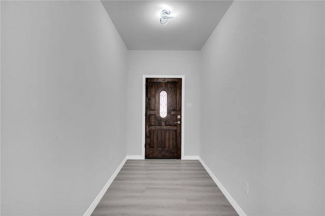 doorway with light hardwood / wood-style flooring