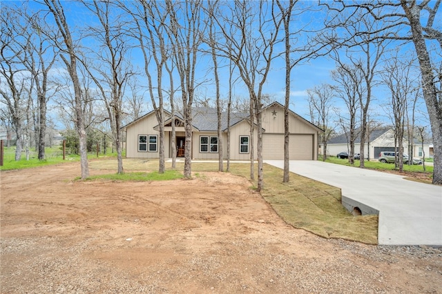 single story home with a garage