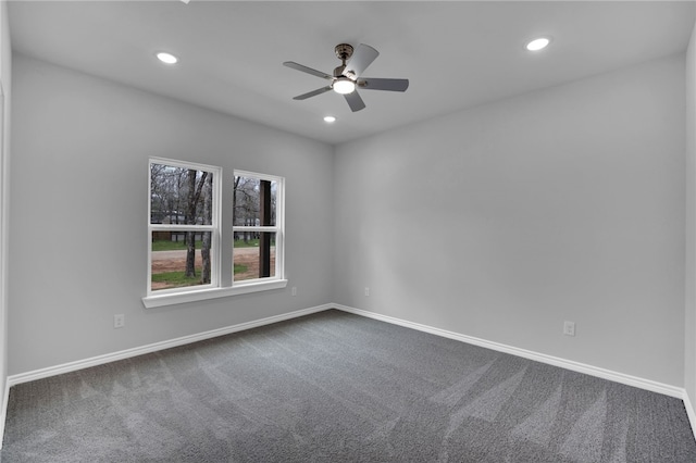 unfurnished room featuring carpet and ceiling fan