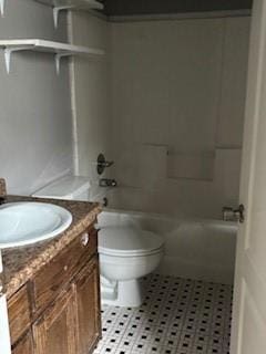 full bathroom featuring toilet, tile patterned floors, vanity, and bathing tub / shower combination