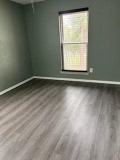 empty room featuring hardwood / wood-style floors