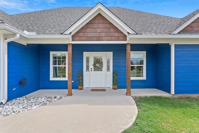 entrance to property with a porch