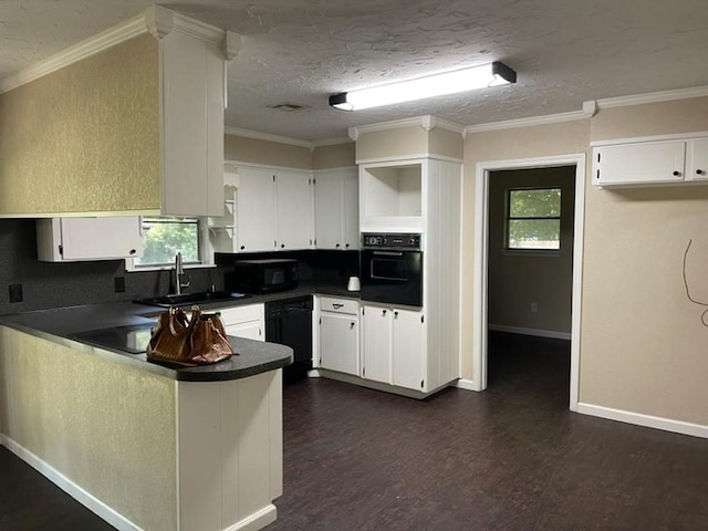 kitchen with dark wood finished floors, open shelves, dark countertops, a peninsula, and black appliances