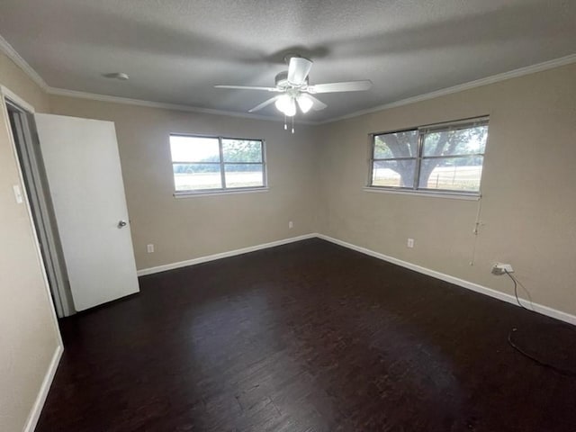 unfurnished bedroom featuring ceiling fan, baseboards, dark wood-type flooring, and ornamental molding