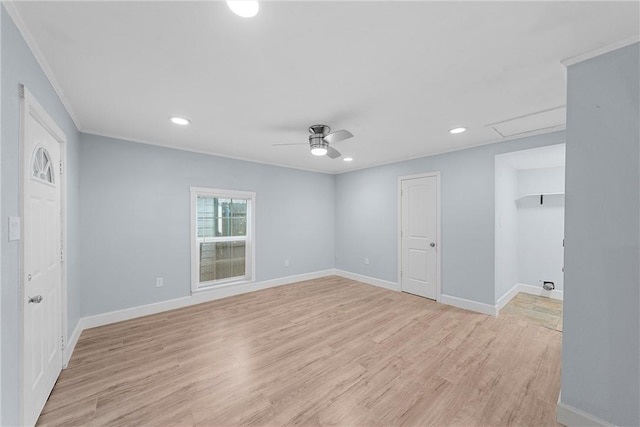 unfurnished bedroom featuring light wood-type flooring, ceiling fan, and ornamental molding